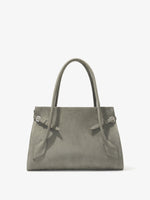 Front image of Tate Bag in Smooth Calf in SLATE with sides cinched and front flap tucked