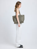 Image of model wearing Days Tote in Pebbled Calf Skin in SLATE