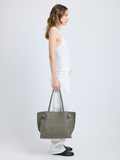 Image of model carrying Days Tote in Pebbled Calf Skin in SLATE