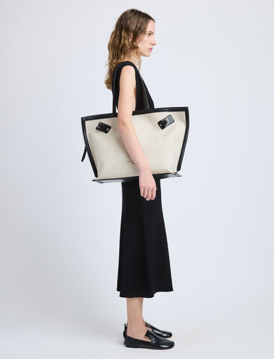 Proenza Schouler image of model carrying  Days Carryall in Natural Linen in natural/black