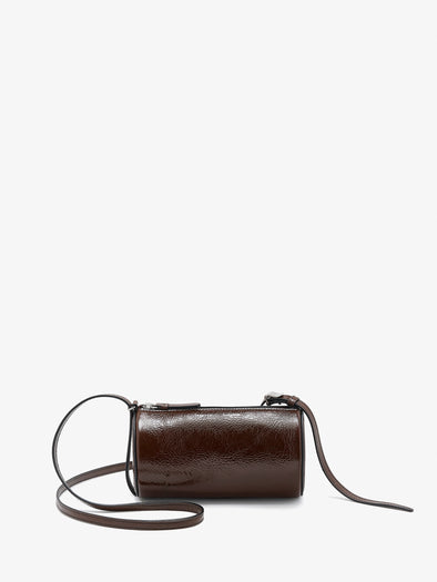 Proenza Schouler front image of Crossbody Silo Bag in Shiny Calf in cedar with strap folded down