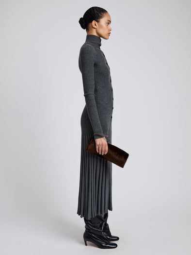 Proenza Schouler Image of model wearing Silo Clutch in Shearling in Chocolate