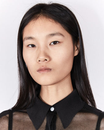 4x5 cropped portrait of model Canlan Wang for FW24 Runway 