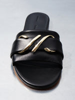 Aerial image of Monogram Slide Sandals in black on silver backdrop