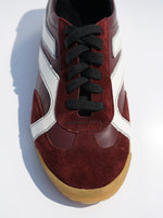 Cropped aerial image of Track Sneakers in oxblood