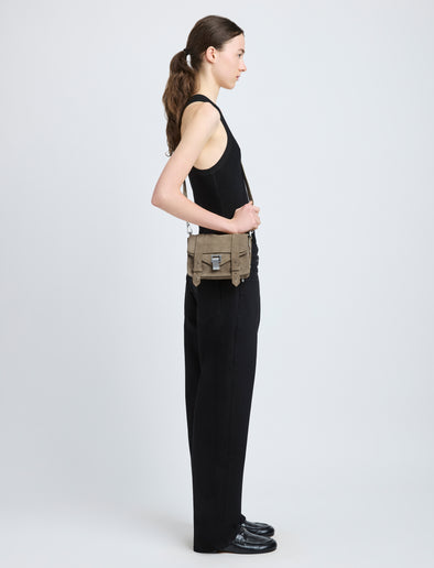 Proenza Schouler image of model wearing PS1 Mini Crossbody Bag in Nubuck Calf in slate