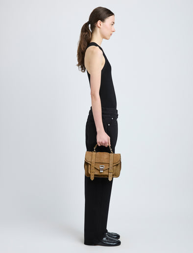 Proenza Schouler image of model wearing PS1 Tiny Bag in Nubuck Calf in tobacco