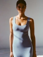 Cropped image of model wearing Lucia Dress in Souffle Knit in lark blue