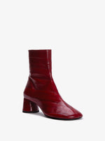 Proenza Schouler 3/4 front image of Monogram Heeled Loafers in Eel in ROSEWOOD