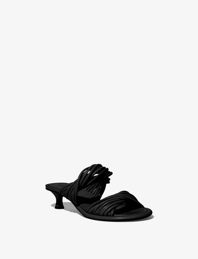 Front 3/4 image of Pipe Slide Sandals in black