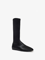 Proenza Schouler 3/4 front image of Tee Stretch Ankle Boots in BLACK