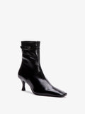 Proenza Schouler 3/4 front image of Trap Ankle Boots in BLACK