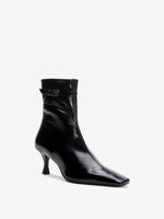 Proenza Schouler 3/4 front image of Trap Ankle Boots in BLACK