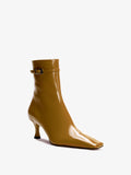 Front image of the Trap Ankle Boots in CAMEL