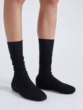 Proenza Schouler cropped image of model wearing Tee Knit Ankle Boots in BLACK