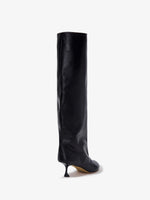 3/4 Back image of TEE KNEE HIGH BOOTS in BLACK