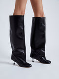 Image of model wearing TEE KNEE HIGH BOOTS in BLACK