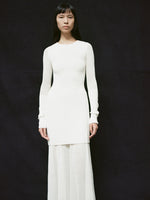 Cropped image of a model wearing Anita Dress in Knit Sheer Mesh in off white.