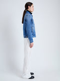 Side image of model wearing Newman Jacket in medium blue