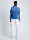 Back image of model wearing Newman Jacket in medium blue