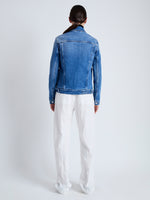 Back image of model wearing Newman Jacket in medium blue