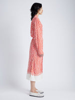 Side full length image of model wearing Bailey Dress in Printed Viscose Crepe in VERMILLION MULTI