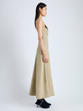 Side full length image of model wearing Ruby Dress in Eco Stretch Linen Viscose in BRONZE