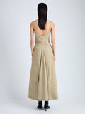 Back full length image of model wearing Ruby Dress in Eco Stretch Linen Viscose in BRONZE