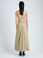 Back full length image of model wearing Ruby Dress in Eco Stretch Linen Viscose in BRONZE