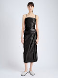 Front image of model wearing Delancy Dress in Glossy Leather in black