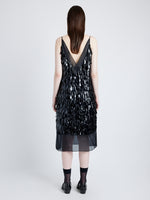 Back image of model wearing Irene Dress in Resin Embroidered Organza in BLACK