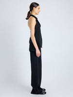 Side image of model wearing Theda Top in Printed Viscose Crepe in black