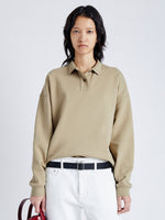 Cropped front image of model wearing Brooks Polo in Cotton Terry Jersey in bronze