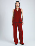 Front image of model wearing Miller Top in Light Matte Viscose Crepe in red