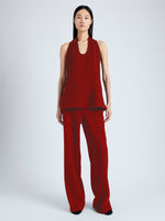 Front image of model wearing Miller Top in Light Matte Viscose Crepe in red