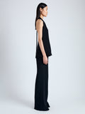 Side full length image of model wearing Miller Top in Light Matte Viscose Crepe in BLACK