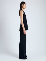 Side full length image of model wearing Miller Top in Light Matte Viscose Crepe in BLACK