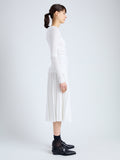 Side full length image of model wearing Margo Skirt in Gauzy Jersey in WHITE