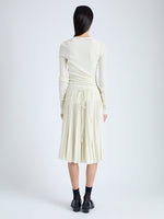 Back image of model wearing Margo Skirt in Gauzy Jersey in BONE