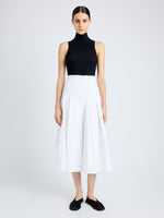 Front image of model wearing Moore Skirt in Organic Cotton Twill in off white