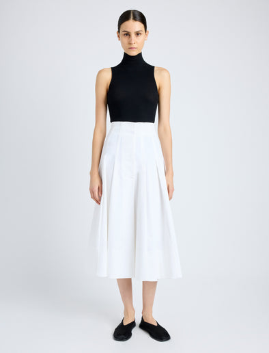 Front image of model wearing Moore Skirt in Organic Cotton Twill in off white