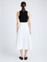 Back image of model wearing Moore Skirt in Organic Cotton Twill in off white