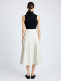 Back image of model wearing Moore Skirt in Organic Cotton Twill in wheat