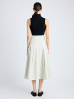 Back image of model wearing Moore Skirt in Organic Cotton Twill in wheat