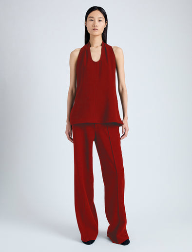 Front image of model wearing Weyes Pant in Light Matte Viscose Crepe in red