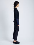 Side image of model wearing Myers Pant in Tropical Wool in Black