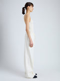 Side full length image of model wearing Jade Pant in Eco Stretch Linen Viscose in PEARL