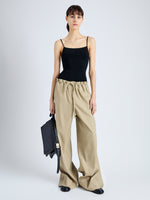 Front full length image of model wearing Jade Pant in Eco Stretch Linen Viscose in BRONZE