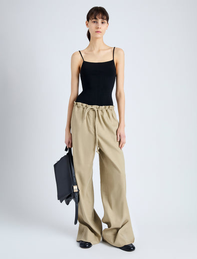 Front full length image of model wearing Jade Pant in Eco Stretch Linen Viscose in BRONZE