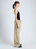 Side full length image of model wearing Jade Pant in Eco Stretch Linen Viscose in BRONZE